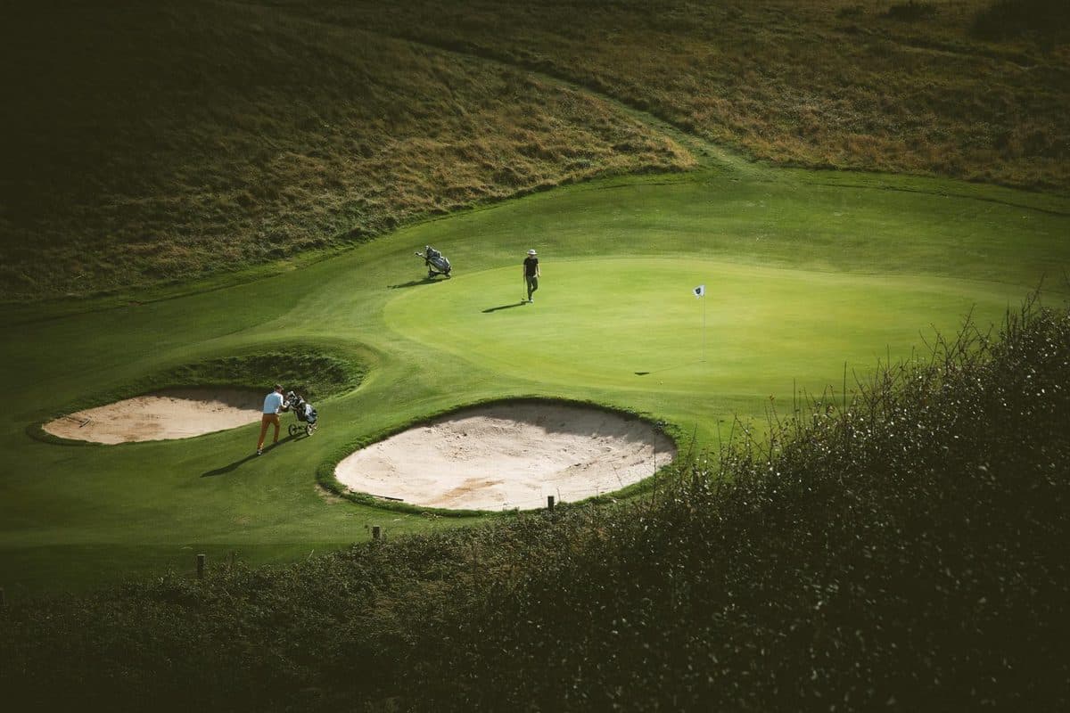 A golf course in Edinburgh with views of the Scottish capital in the background