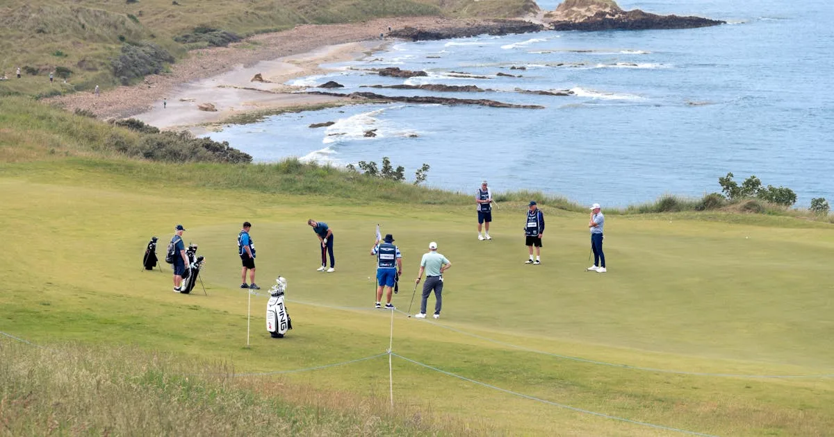Golfers enjoying a round on a scenic coastal course with ocean views