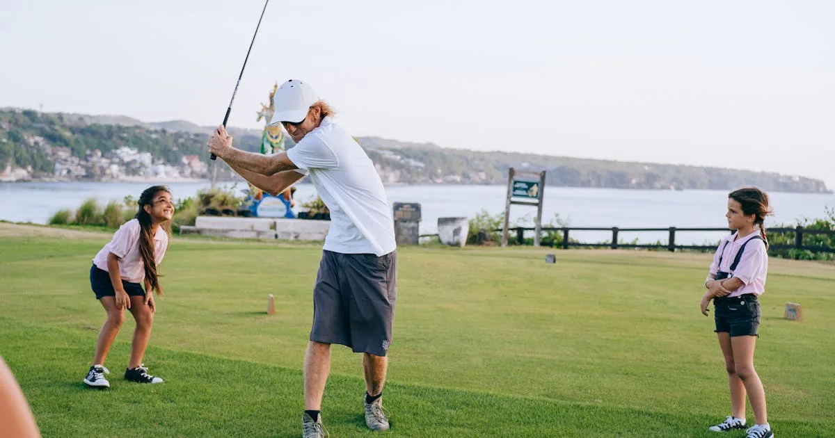 A family enjoying a round of golf on a scenic coastal course
