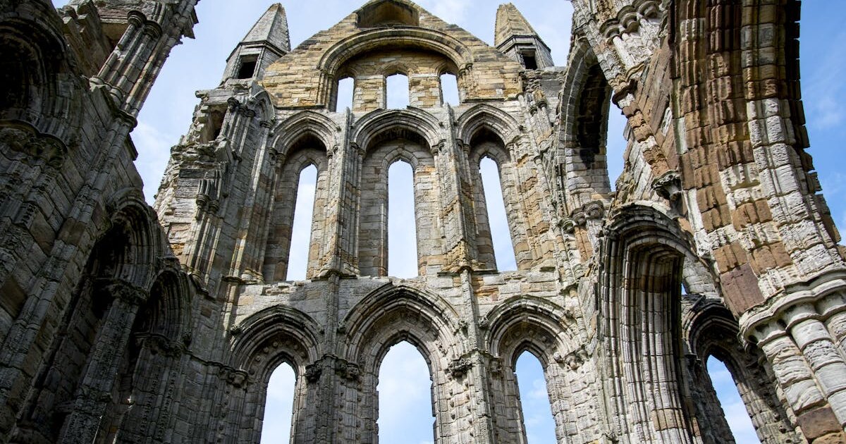 Caernarfon Castle and harbour on the Menai Strait in North Wales