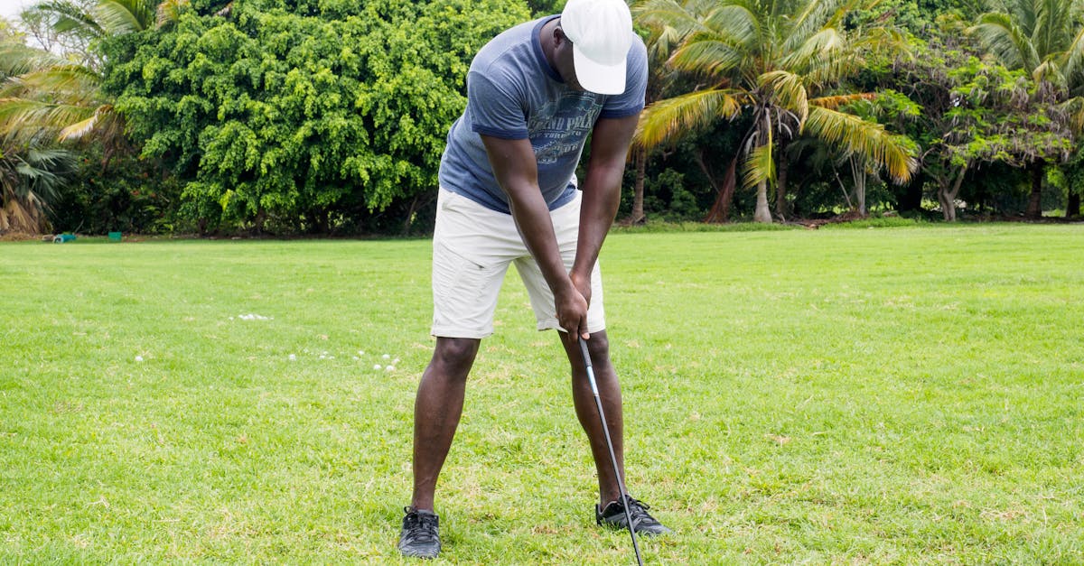 Championship parkland fairway at The Belfry with the famous clubhouse visible in the background across Warwickshire countryside