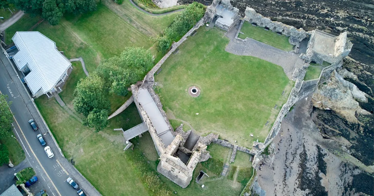 Aerial view of the historic St Andrews Castle ruins overlooking the North Sea in Fife, Scotland
