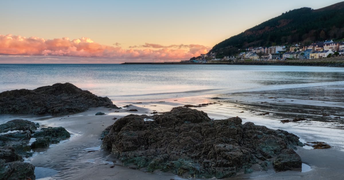 The Mourne Mountains rising behind the coastline near Newcastle, County Down