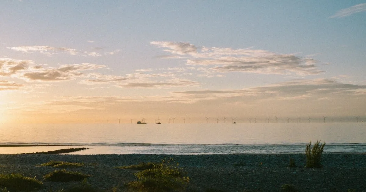 North Wales coastline with sandy beach and green hills